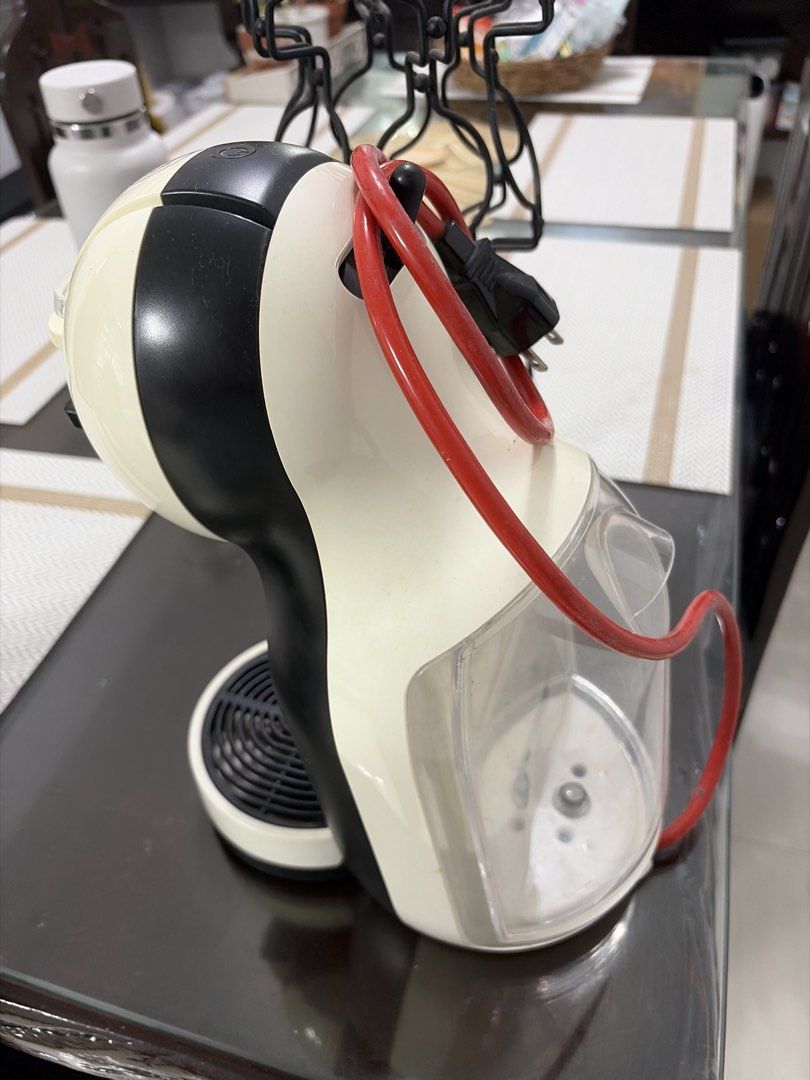 Nescafé Dolce Gusto Mini Me Coffee Machine + Capsule Holder (Category: Coffee Machines & Makers) located in Manila. Submitted by kaith006 (Listing ID 1454837494, Image 3). Description: Pre-loved and still in good working condition. Comes with the capsule/pod holder shown in the photo. ☕️ Perfect for quick and easy coffee at home. Selling as a set..