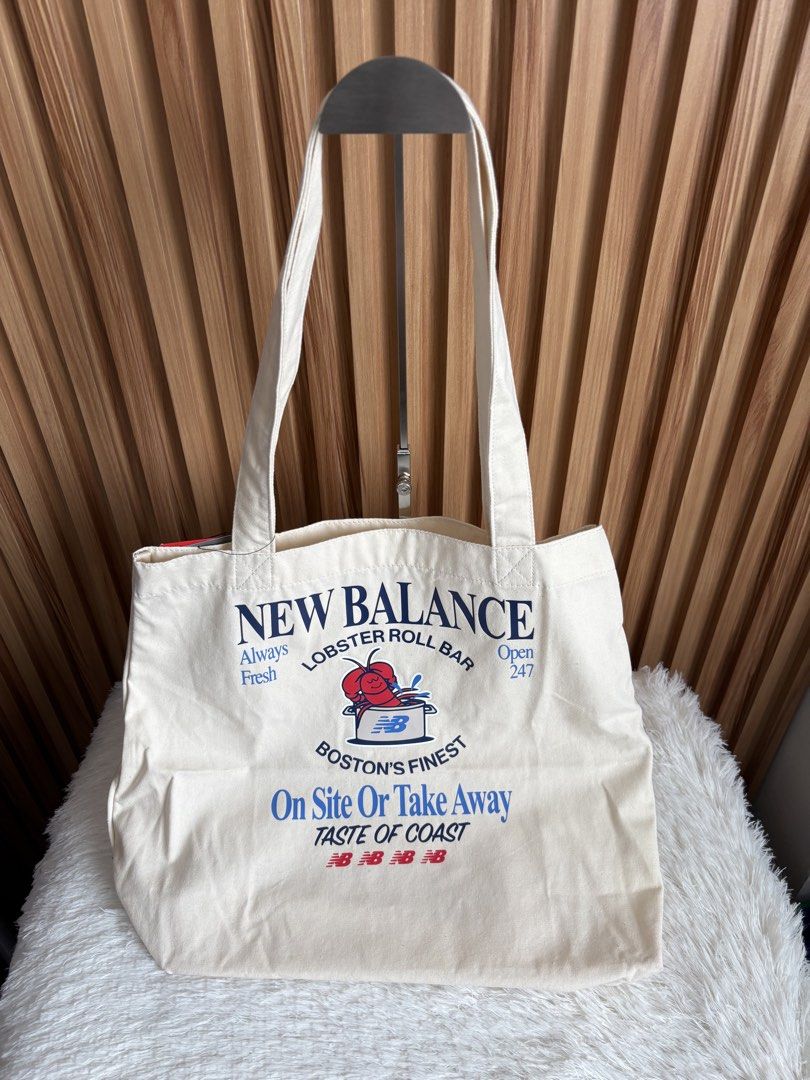 NEW BALANCE TOTE BAG (Category: Tote Bags) located in Imus. Submitted by dumpitlikeaqueen (Listing ID 1454799249, Image 2). Description: • Store-bought in Taiwan • With tag & paper bag • Open for layaway • Instagram Shop: @dumpitlikeaqueen.