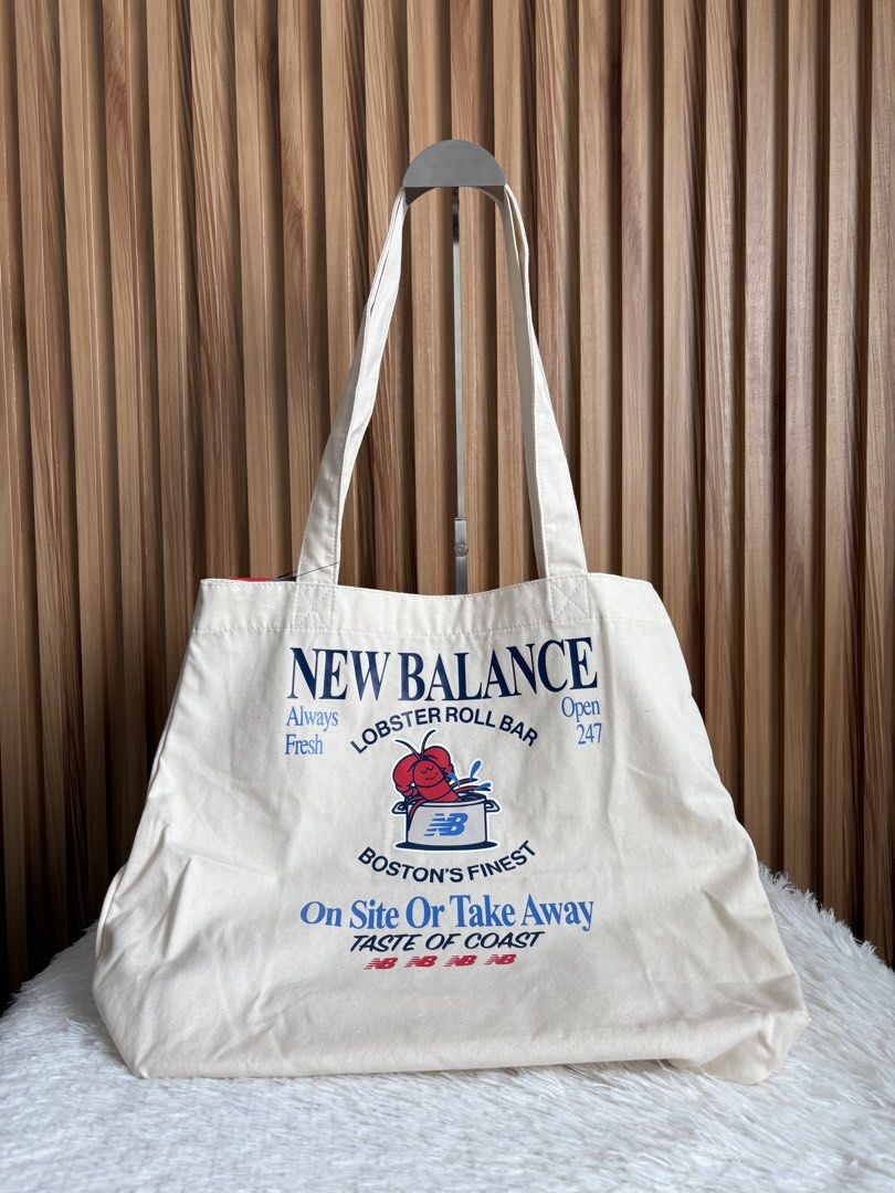 NEW BALANCE TOTE BAG (Category: Tote Bags) located in Imus. Submitted by dumpitlikeaqueen (Listing ID 1454799249, Image 1). Description: • Store-bought in Taiwan • With tag & paper bag • Open for layaway • Instagram Shop: @dumpitlikeaqueen.