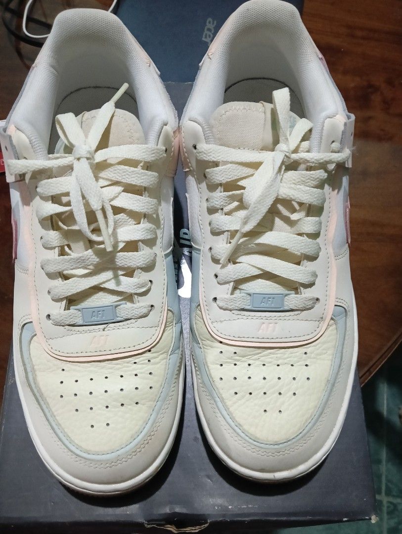 Nike Air Force 1 Shadow Coconut Milk Multi-Color (Category: Sneakers) located in Manila. Submitted by km45136605931 (Listing ID 1454752293, Image 3). Description: - Nike Air Force 1 Shadow - Color: Coconut Milk with pastel peach and light blue accents - Size: 10 US Women - Features a platform sole for added height - Includes original box.