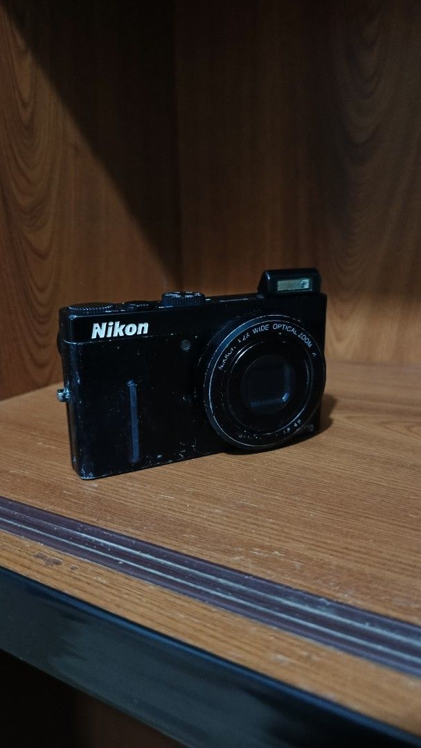 Nikon COOLPIX P300 Digital Camera For display (Category: Cameras) located in Arayat. Submitted by akahana_ (Listing ID 1454802695, Image 2). Description: - Rare Black Nikon COOLPIX P300 digital camera - For parts or for display only - well used - lens error: not fixable. .