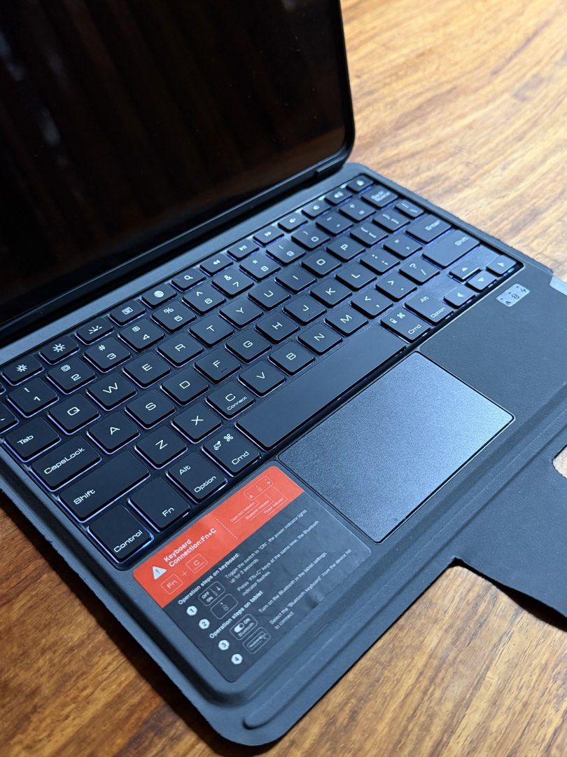 Nillkin Keyboard Case For Ipad Pro M1 11" (Category: Cases & Sleeves) located in Manila. Submitted by rocco_ (Listing ID 1454881105, Image 3). Description: - Nillkin Black Keyboard Case for Tablets - Built-in Stand for Hands-Free Viewing - Backlit Bluetooth Keyboard - Integrated Trackpad - Ideal for Mobile Productivity - Selling As Is.