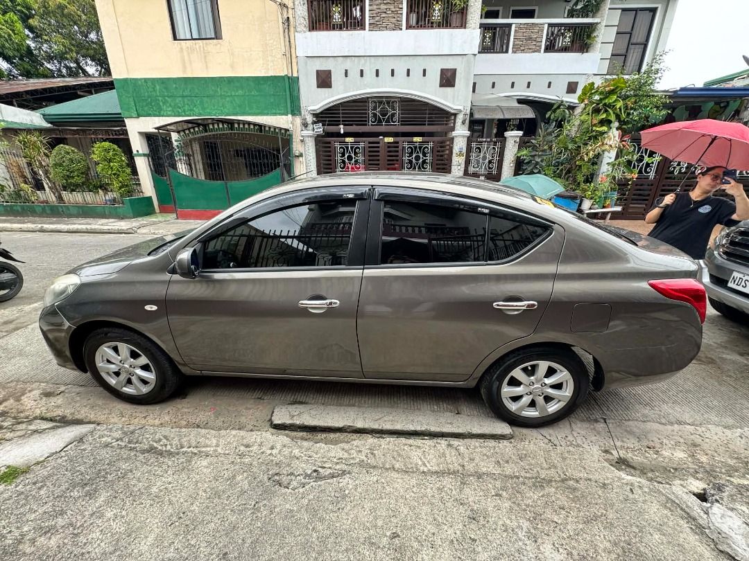 Nissan Almera 1.5 (M) (Category: Used Cars) located in Manila. Submitted by eruyotto (Listing ID 1454771988, Image 3). Description: *Selling pre-loved 2015 Nissan Almera *Lady-owned (clean interior, no foul odor from smoking and/or other vices) *first user *Alaga sa regular PMS *With ceramic coating, maintenance good for 2 years *apple/android carplay *all electronics are working properly (windows, door locks, side mirror) *very minor dents and s