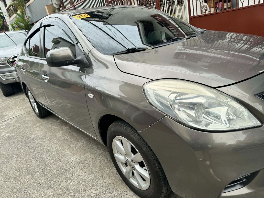 Nissan Almera 1.5 (M) (Category: Used Cars) located in Manila. Submitted by eruyotto (Listing ID 1454771988, Image 2). Description: *Selling pre-loved 2015 Nissan Almera *Lady-owned (clean interior, no foul odor from smoking and/or other vices) *first user *Alaga sa regular PMS *With ceramic coating, maintenance good for 2 years *apple/android carplay *all electronics are working properly (windows, door locks, side mirror) *very minor dents and s