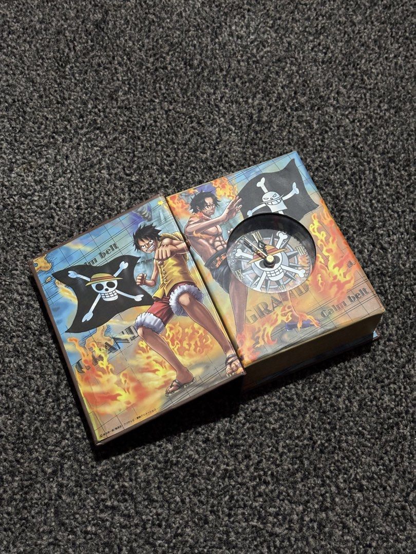 One Piece Book Type Clock (Category: Clocks) located in Bulacan. Submitted by thriftstarph (Listing ID 1454801983, Image 1). Description: PLEASE READ THE DESCRIPTION BELOW‼️ One Piece Clock Book Type Double AA+ Issue: corner .