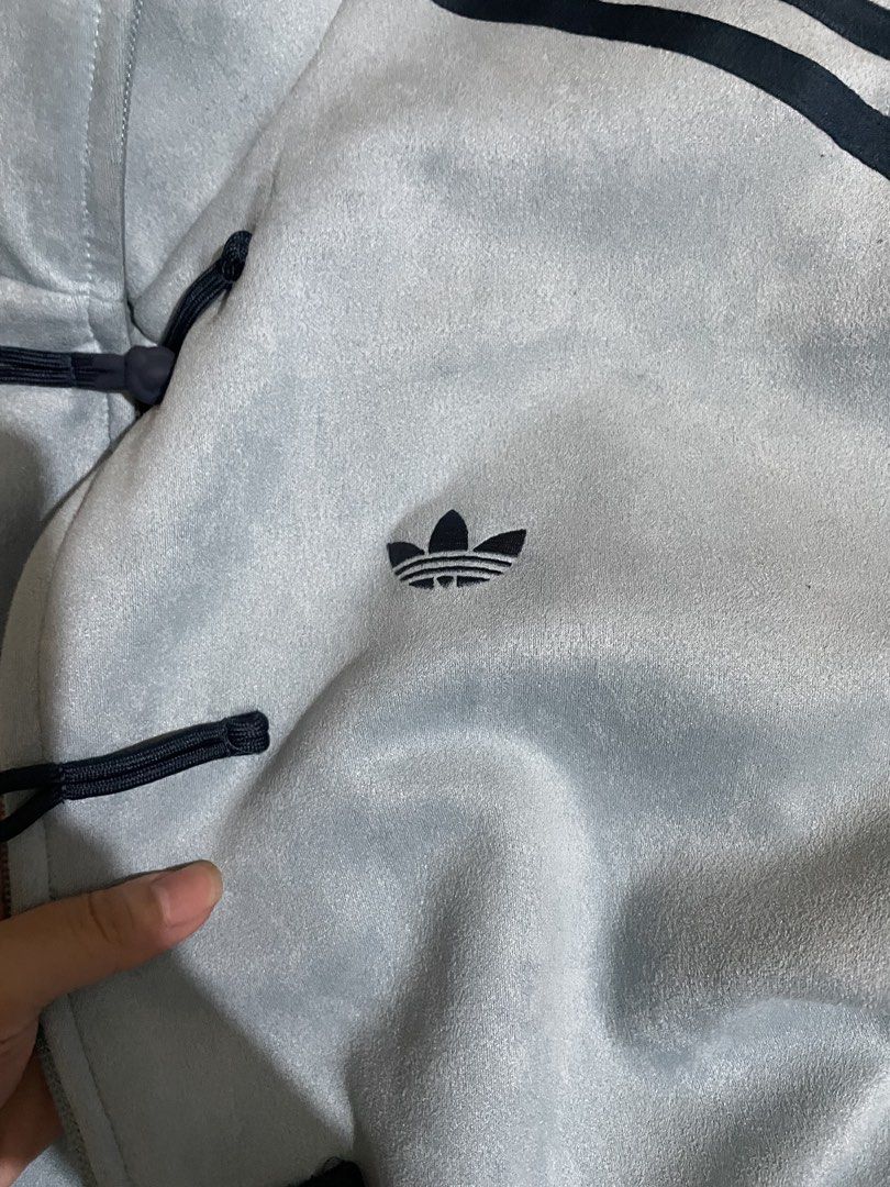 ORIG Adidas Light Blue Chinese NY JACKET (Category: Coats, Jackets and Outerwear) located in Manila. Submitted by avieeees (Listing ID 1454807983, Image 2). Description: - ONLY USED TWICE - BOUGHT FROM TAIWAN -Light blue Adidas track jacket - Classic three stripes on sleeves - Unique Chinese frog button closures - Size: Medium (M) - Ideal for casual wear or sports activities.
