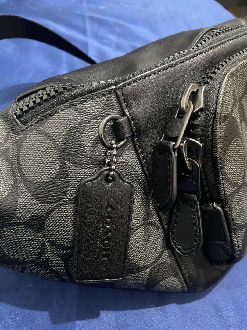 Original Coach Body Bag - Black Monogram (Category: Luxury Bags & Wallets) located in Manila. Submitted by cristelaaa9 (Listing ID 1454950661, Image 3). Description: - Authentic Coach black monogram body bag - Originally purchased in the US for 25,000 PHP - Selling for only 12,500 PHP - Used only twice.