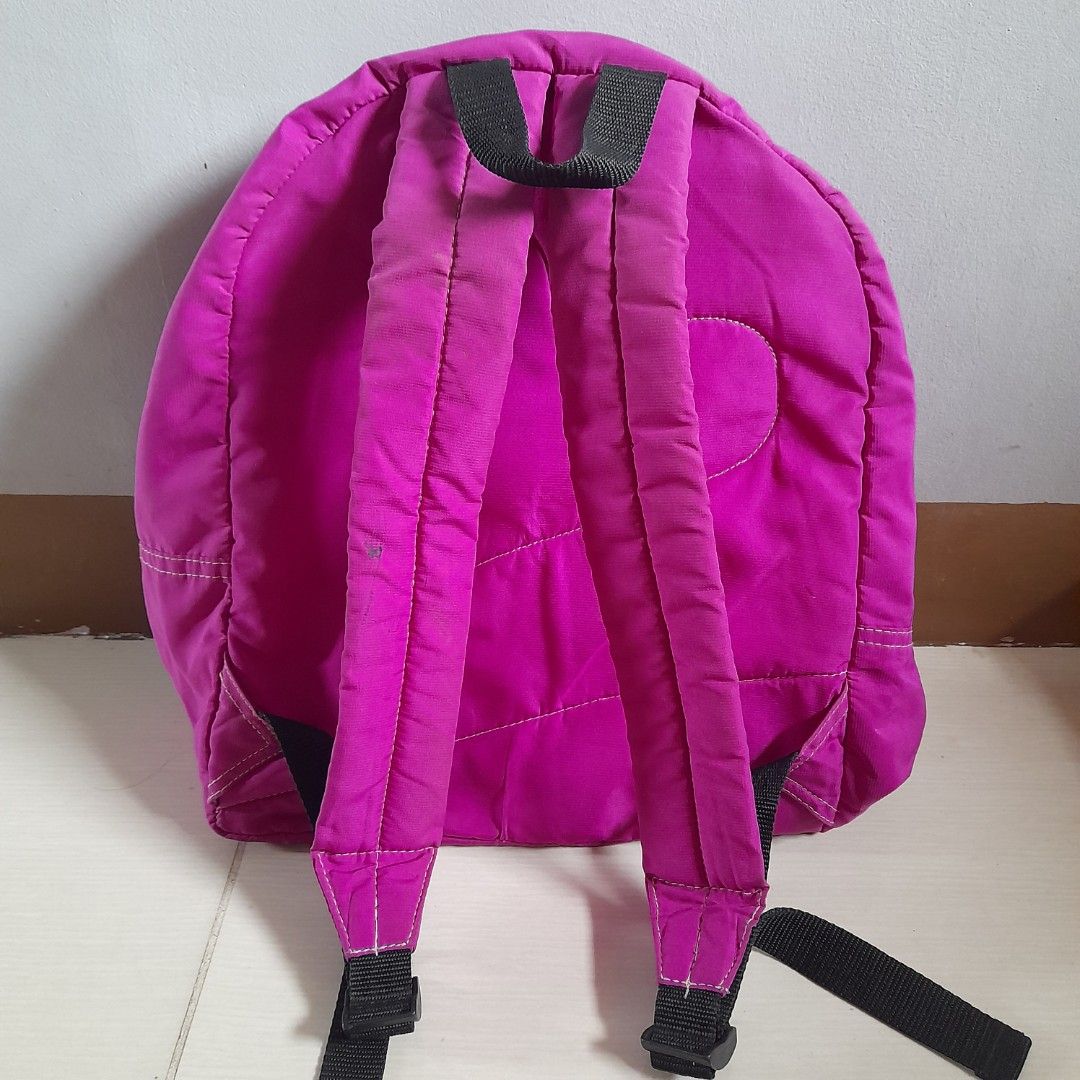Original Heartstrings Classic Backpack - Magenta Pink / Fuchsia (Category: Backpacks) located in Dasmarinas. Submitted by pb_declutters (Listing ID 1454780266, Image 2). Description: Authentic Heartstrings Classic Backpack 🎒✨ Color: Magenta Pink / Fuchsia with white contrast stitching Details & Features: • Distinct embroidered brown "heartstrings" logo patch on the front center • Spacious main compartment with smooth-gliding dark teal/blue zippe