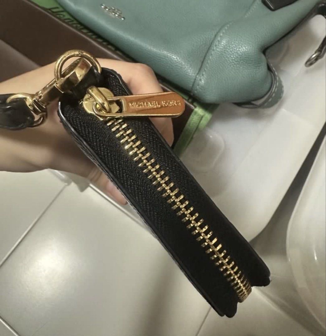 Original Michael Kors Black Wallet (Category: Luxury Bags & Wallets) located in Cavite. Submitted by irenebaebaebidoo (Listing ID 1454938777, Image 3). Description: Almost new! Guaranteed Authentic 💯 Message me for more pictures!.