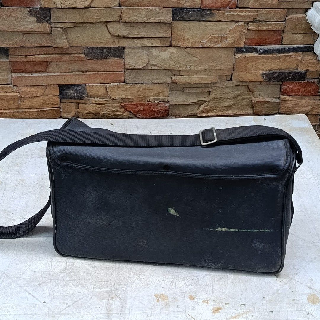 Panasonic Camera Bag (Category: Camera Bags & Carriers) located in Las Pinas. Submitted by 84vintage (Listing ID 1454789383, Image 2). Description: Solid and sturdy bag originally for vintage video cameras. Can be repurposed to house your tools and other hobbies as the bag is a little longer than usual at 15 inches. Two layers for storing your small stuff underneath the main layer. Of you want a reliable bag from the 80s, this is it. Sold as it i