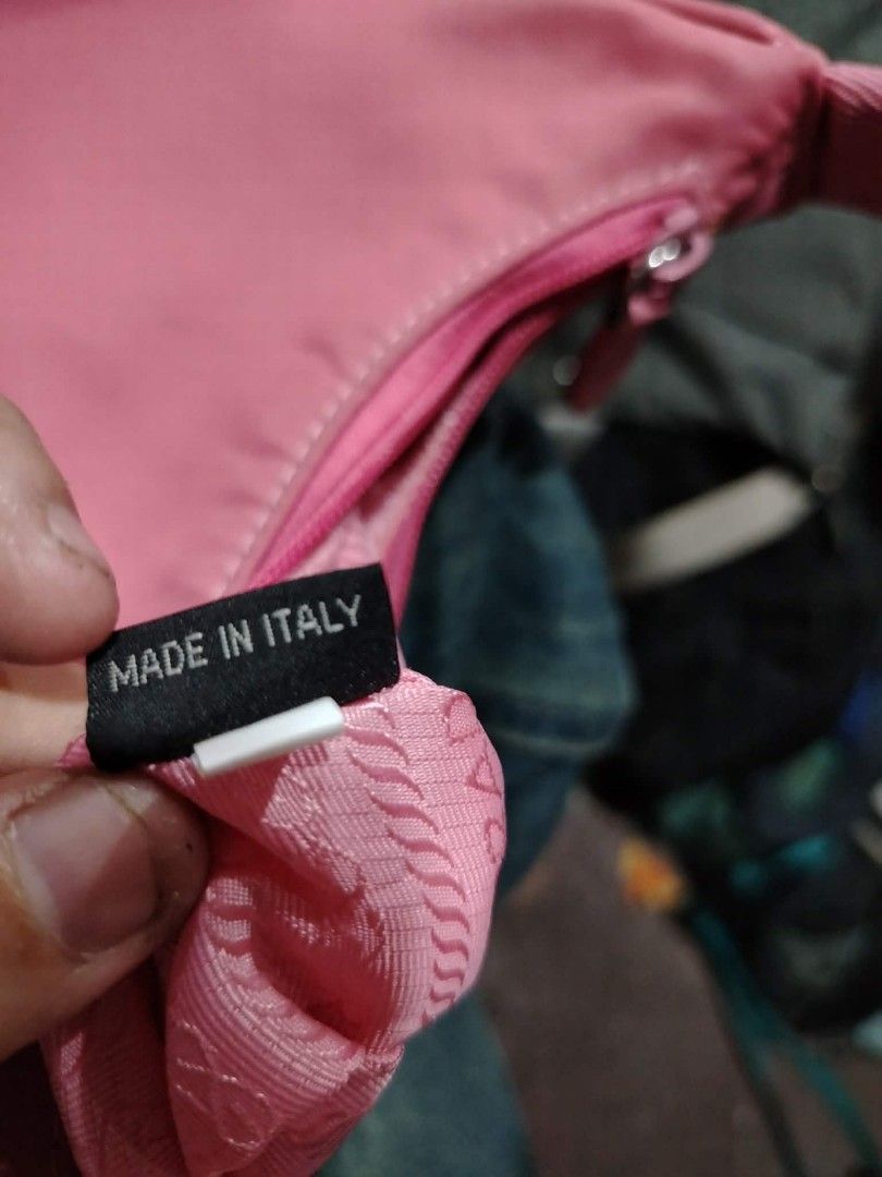 Pink Prada Nylon Shoulder Bag (Category: Luxury Bags & Wallets) located in Manila. Submitted by jzk25 (Listing ID 1454782941, Image 2). Description: - Cute pink Prada shoulder bag - Made in Italy - Nylon material - Zipper closure - Small and compact, ideal for essentials - Adds a perfect pop of color to any outfit - Please check photos for detailed condition.