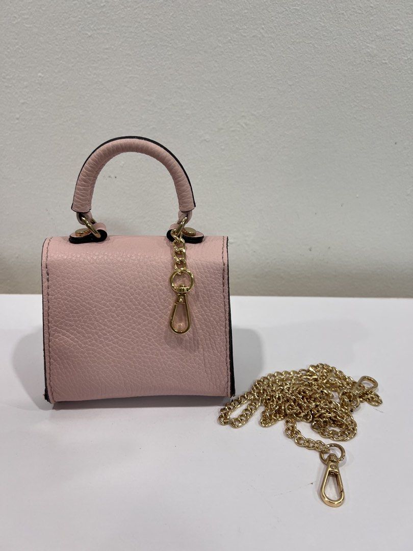 Pink small bag (Category: Purses & Pouches) located in Manila. Submitted by threadtressure (Listing ID 1454910465, Image 2). Description: Pink small bag. Comes with chain Condition: 10/10 No issues No box/paper bag. See photos for full inclusions.