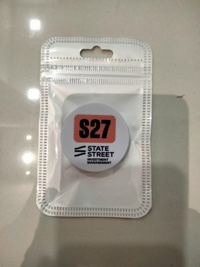 Pop Socket (Category: Other Gadgets) located in Singapore. Submitted by blee76 (Listing ID 1454887132, Image 1). Description: - Features S27 STATE STREET INVESTMENT MANAGEMENT logo. - Brand new and comes in original packaging. - Provides secure and comfortable grip for your phone. - With strong 3M adhesive.