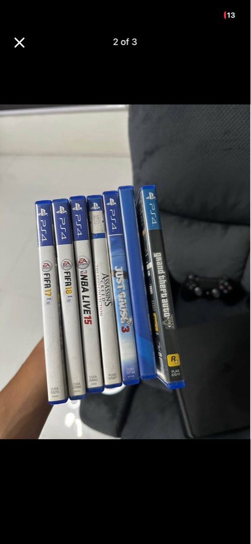PS4 Slim Console with 2 Controllers and Games (Category: PlayStation) located in Manila. Submitted by danielly23 (Listing ID 1454878402, Image 3). Description: - PlayStation 4 Slim Console - 1 TB (Not Jailbreak) - Two (2) Controllers - Twin Controller Charging Dock - Games Included: - FIFA 17 - FIFA 18 - NBA Live 15 - Just Cause 3 - Assassin's Creed: The Ezio Collection - Grand Theft Auto V - All items in good working condition.