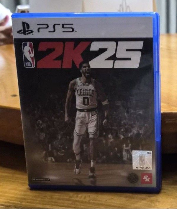 PS5 NBA 2K25 Game (Category: PlayStation) located in Las Pinas. Submitted by epicocean_281525 (Listing ID 1454753523, Image 1). Description: - PS5 NBA 2K25 Game - Features prominent NBA logo and '25' - Cover art showcases an action basketball player - Ideal for basketball enthusiasts - Comes in a standard PS5 game case.