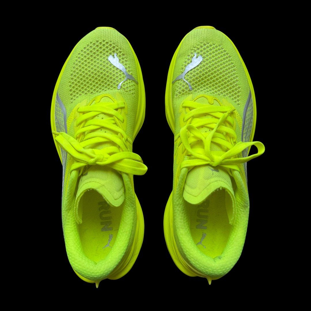 Puma Deviate Nitro 3 Running Shoes - Neon Yellow (Category: Sneakers) located in Taguig. Submitted by ShopCesca (Listing ID 1454789100, Image 2). Description: - Puma Deviate Nitro 3 running shoes - Striking neon yellow color - Lightweight design for optimal performance - Features Puma's Nitro foam for responsive cushioning - Includes a carbon fiber plate for enhanced energy return - Ideal for road running and training sessions - Engineered to hel