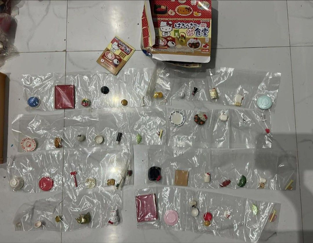 Re-Ment Hello Kitty Miniature Food Set (Category: Kids Toys) located in Manila. Submitted by hermylesha32059 (Listing ID 1454853187, Image 1). Description: - Authentic Re-Ment Kitty miniature food set. - Ideal for dollhouse kitchens, dioramas, or personal collections. - Features a variety of tiny, detailed food items. - Comes with miniature plates and kitchenware. - Some pieces are still in their original, sealed packaging. - Includes the origina