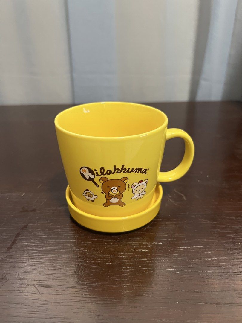 Rilakkuma mug (Category: Coffee & Tea Tableware) located in Manila. Submitted by rlab_japan_thrift (Listing ID 1454862766, Image 1). Description: **San-X Rilakkuma Yellow Ceramic Mug with Lid / Coaster Set** 💛🐻 Super cute bright yellow San-X Rilakkuma ceramic mug set featuring a multi-purpose matching lid/saucer! Perfect for tea, coffee, or San-X collectors. * **Character:** Rilakkuma, Korilakkuma & Kiiroitori (San-X) * **Color:** Bright Yellow
