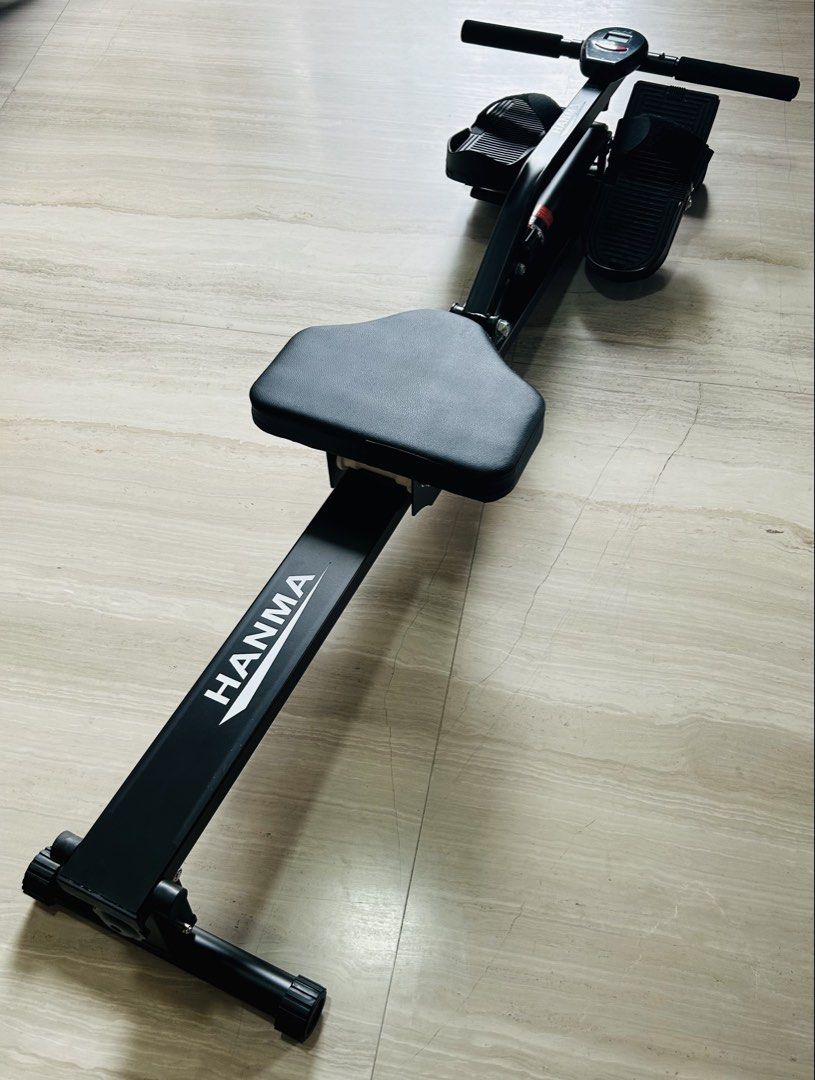 rowing machine (Category: Cardio & Fitness Machines) located in Singapore. Submitted by mcpeanuts (Listing ID 1454833162, Image 1). Description: pneumatic rowing machine. adjustable, 12 settings. comes with battery-operated counter (non-functional). originally about $100..