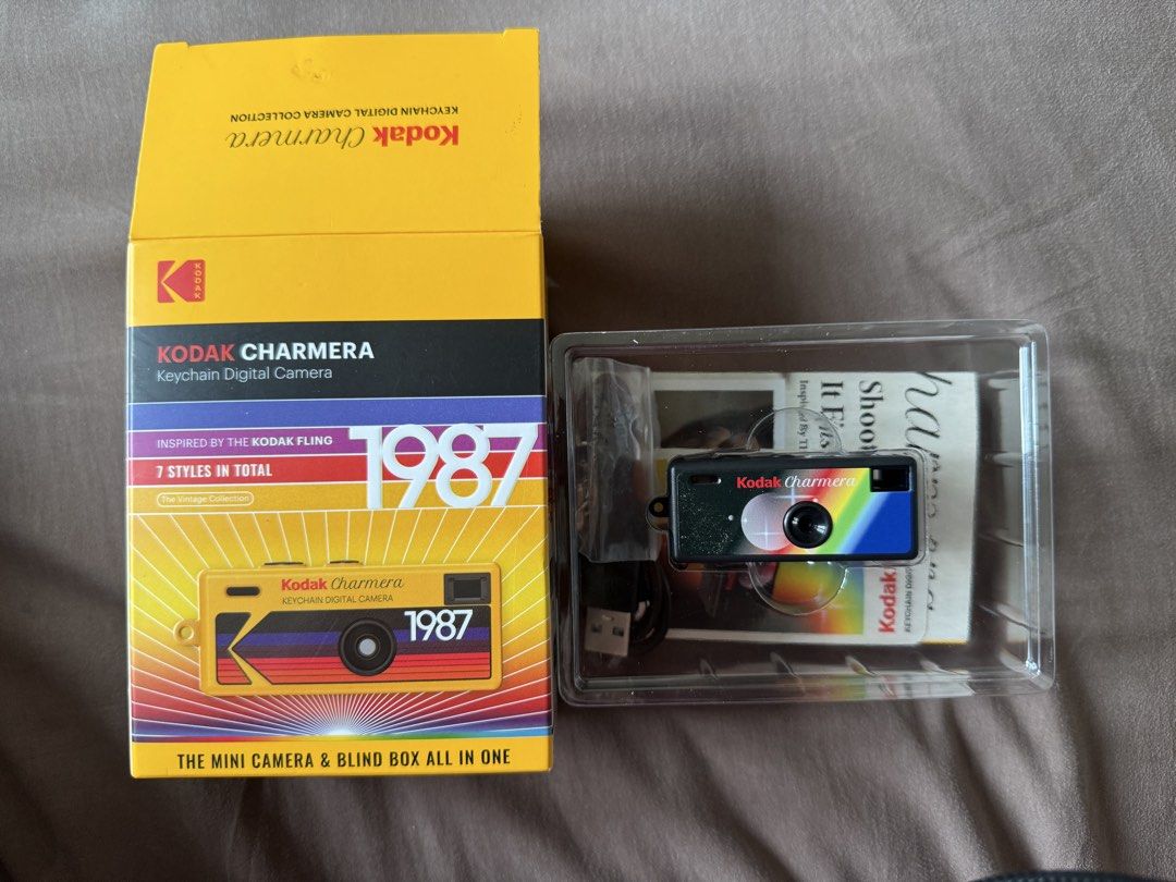 RUSH Kodak Charmera Keychain Camera (Category: Cameras) located in Paranaque City. Submitted by issaytrillanes_ (Listing ID 1454812059, Image 2). Description: SELLING: Kodak Charmera Black and Rainbow variant - Never used - With box and charging cable Slightly negotiable .