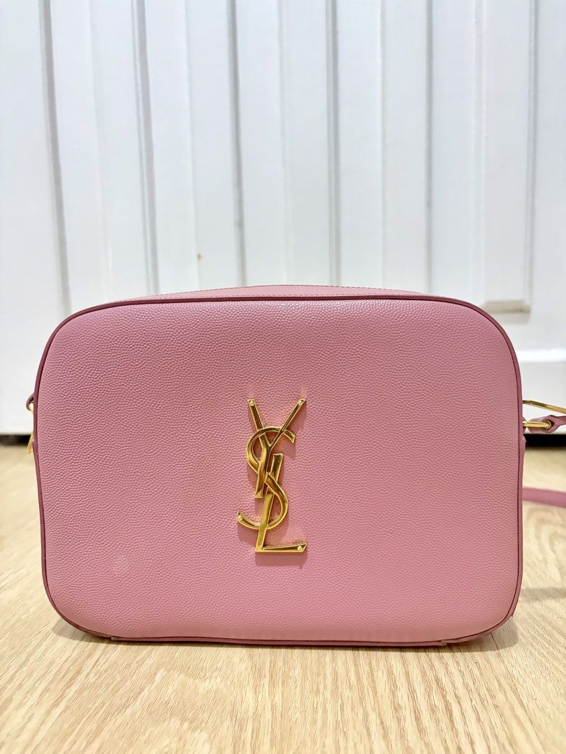 Saint Laurent Pink YSL Camera Bag (Category: Luxury Bags & Wallets) located in Manila. Submitted by mikee.dg (Listing ID 1454903886, Image 2). Description: - Authentic Pink YSL Camera Bag - Gold Hardware - Genuine Leather Material - Comes with Authenticity Cards and Care Tags - Ideal for Everyday Use.
