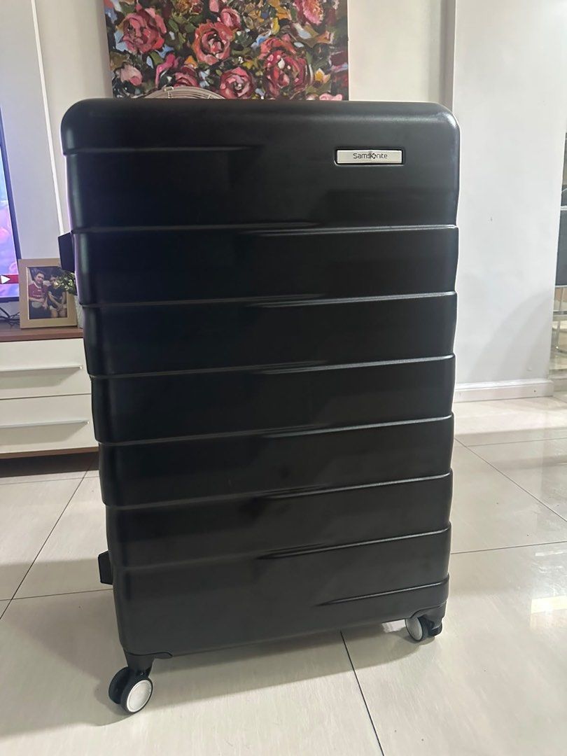 Samsonite Black Hardshell 2 suitcase (Category: Luggage) located in Mandaluyong City. Submitted by madb888 (Listing ID 1454841486, Image 1). Description: Bought in USA only used once - Durable black Samsonite hardshell spinner luggage - Features a secure TSA lock - Comfortable carry handles for easy transport - Smooth-rolling wheels for effortless mobility - Ample interior space for all your essentials - Perfect for any type of trip.