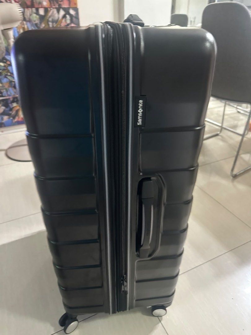 Samsonite Black Hardshell 2 suitcase (Category: Luggage) located in Mandaluyong City. Submitted by madb888 (Listing ID 1454841486, Image 2). Description: Bought in USA only used once - Durable black Samsonite hardshell spinner luggage - Features a secure TSA lock - Comfortable carry handles for easy transport - Smooth-rolling wheels for effortless mobility - Ample interior space for all your essentials - Perfect for any type of trip.