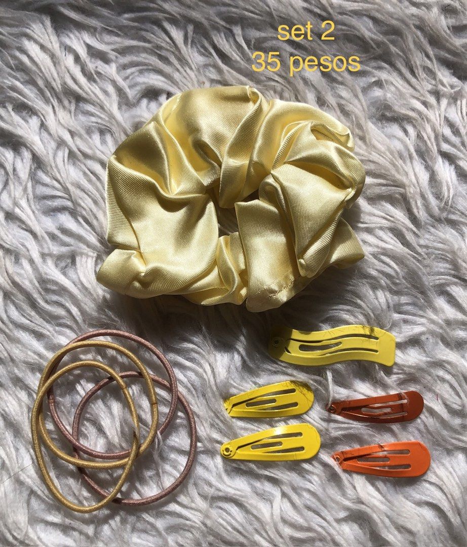 Scrunchie, Hair Ties, and Snap Clips Sets (Category: Hair Accessories) located in Taguig. Submitted by nikikaystuff (Listing ID 1454928218, Image 3). Description: - Cute hair accessory sets available! - Each set includes: 1 satin scrunchie, several hair ties, and snap clips. - Scrunchie color options: white, green, yellow, or silver. - Perfect for everyday styling and adding a pop of color. - Get yours now!.