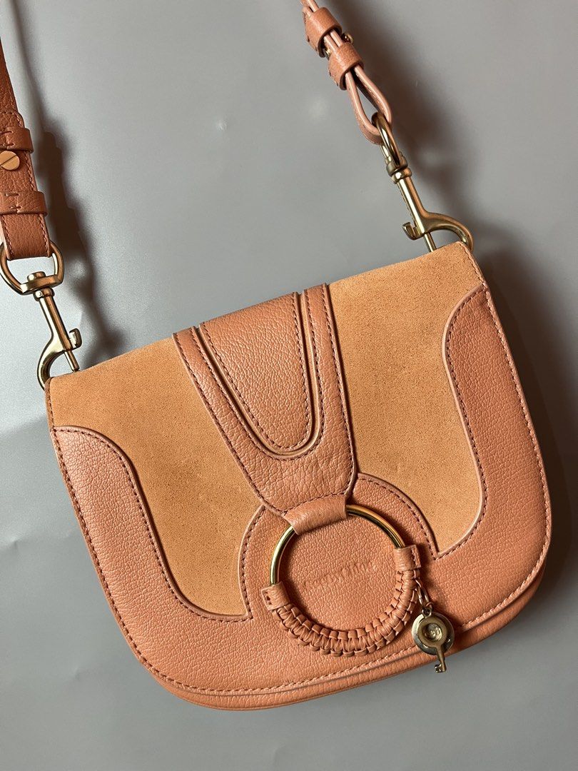See by Chloe Hana small saddle bag (Category: Cross-body Bags) located in Quezon City. Submitted by theideal (Listing ID 1454942200, Image 2). Description: Read first before buy Legit/Authentic See by Chloe Hana small saddle bag No box Still in good and presentable condition No major flaws Minor sign of use only See picture details posted.