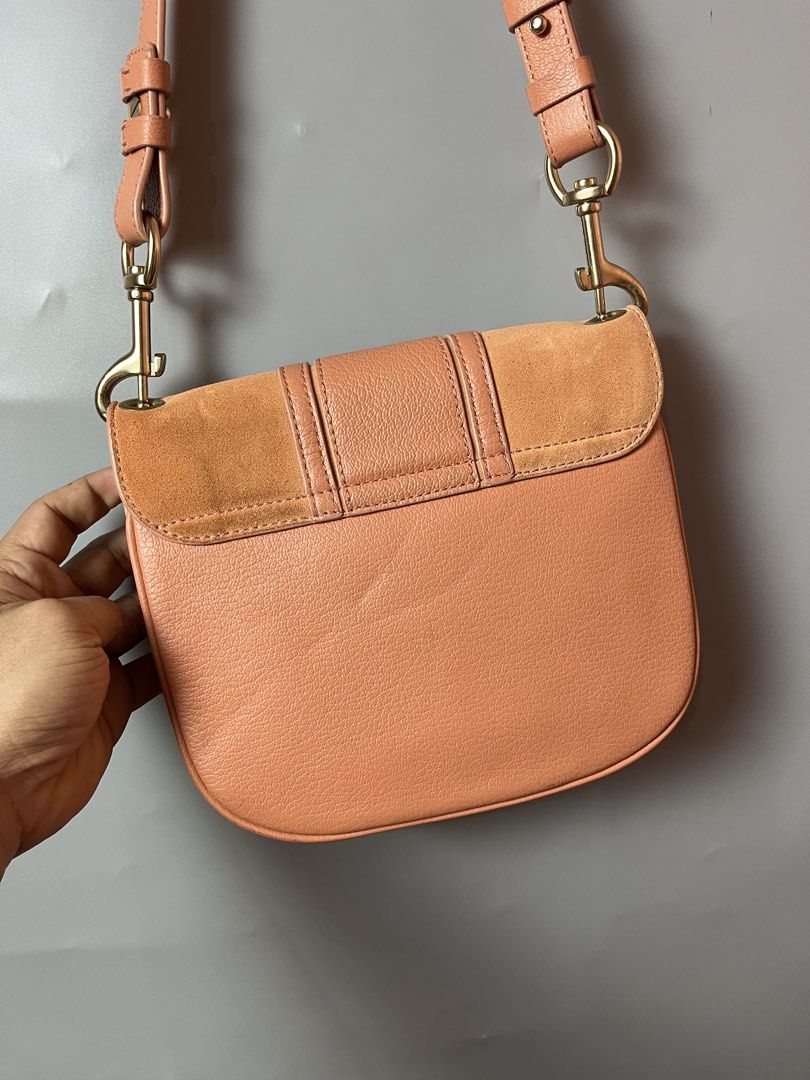 See by Chloe Hana small saddle bag (Category: Cross-body Bags) located in Quezon City. Submitted by theideal (Listing ID 1454942200, Image 3). Description: Read first before buy Legit/Authentic See by Chloe Hana small saddle bag No box Still in good and presentable condition No major flaws Minor sign of use only See picture details posted.