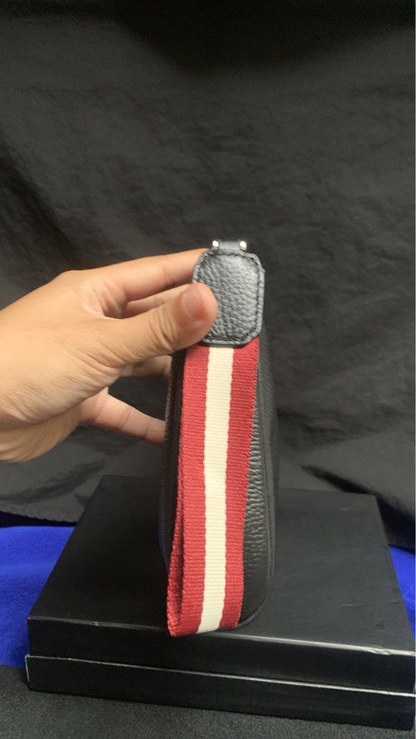 Signature BALLY Clutch Bag (Category: Luxury Bags & Wallets) located in Manila. Submitted by lichking416 (Listing ID 1454854943, Image 3). Description: Signature Bally Clutch Bag Brand new With box and paper bag ₱-2500 .