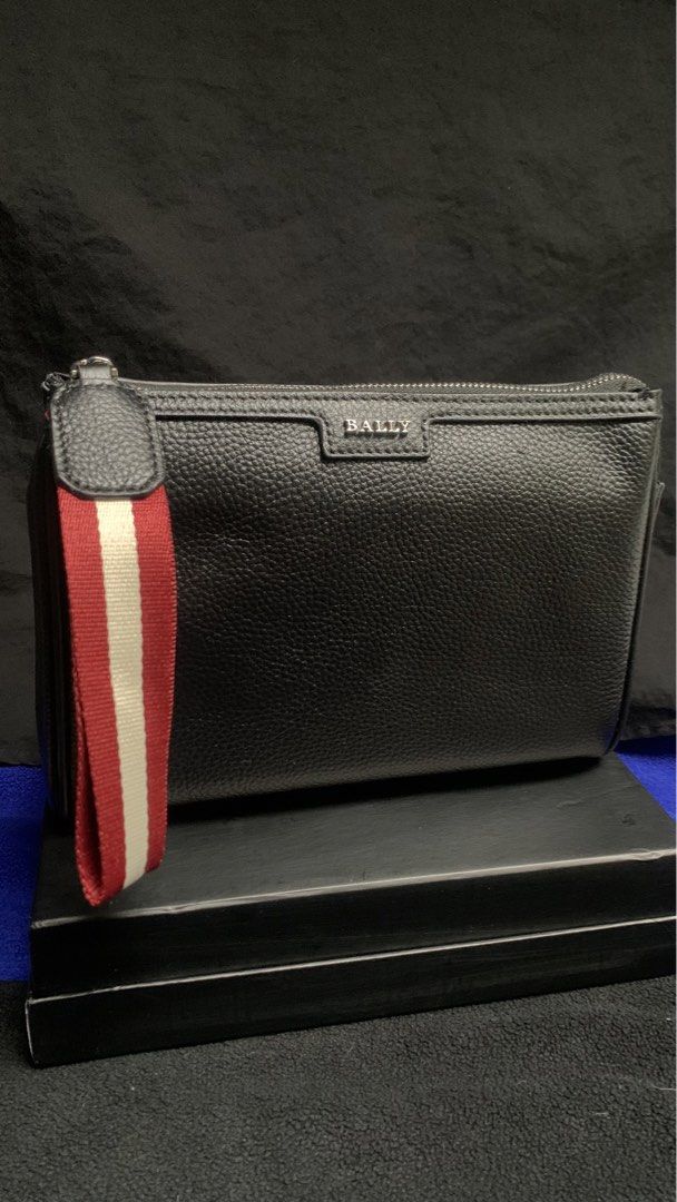 Signature BALLY Clutch Bag (Category: Luxury Bags & Wallets) located in Manila. Submitted by lichking416 (Listing ID 1454854943, Image 2). Description: Signature Bally Clutch Bag Brand new With box and paper bag ₱-2500 .