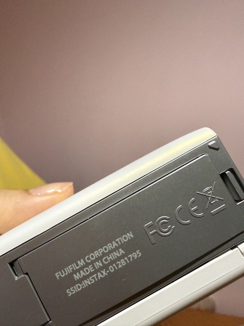 Silver Fujifilm Instax Share SP-2 Photo Printer (Category: Printers, Scanners & Copiers) located in Pasig City. Submitted by mulayph (Listing ID 1454887698, Image 2). Description: - Fujifilm Instax Share SP-2 printer - with wire and original box - Wireless connection - Print instax photos from your phone.