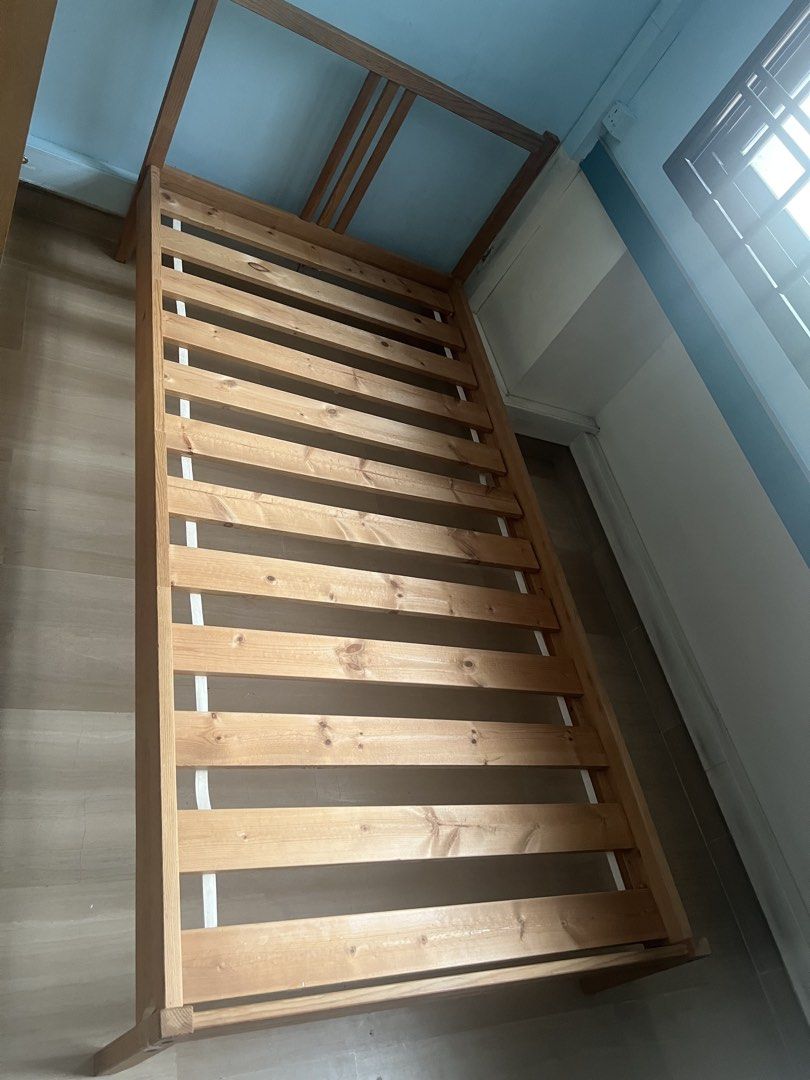 Single bed frame (Category: Bed Frames & Mattresses) located in Singapore. Submitted by benedicto.sams (Listing ID 1454846673, Image 1). Description: Good condition Wood Single bed frame .