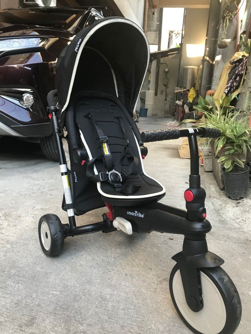 Smart Trike (Category: Strollers) located in Manila. Submitted by kpayum (Listing ID 1454916213, Image 2). Description: - Smart Trike - black - Grows with your child - Parent handle for steering - Safety bar for added security - Seat harness for child's safety - Ideal for outdoor play and learning to ride - Ready for its next adventure! RFS: outgrown.