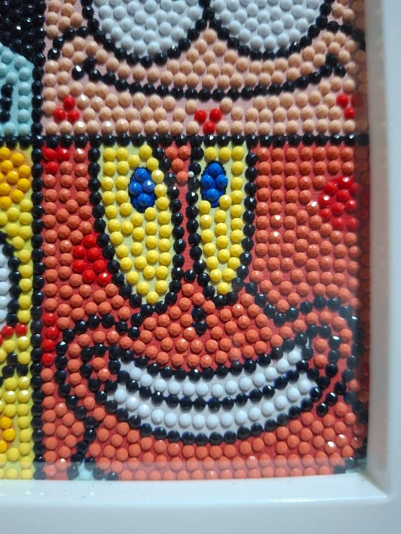 SpongeBob SquarePants Diamond Painting Art Frame (Category: Art & Prints) located in Tagaytay City. Submitted by maestraklarissa (Listing ID 1454889108, Image 2). Description: - Handmade diamond painting art featuring SpongeBob, Patrick, Squidward, and Mr Crabs. - Square frame design. - Perfect for fans of the SpongeBob SquarePants show. - Adds a vibrant pop of color to any room. - Crafted with small, detailed beads..