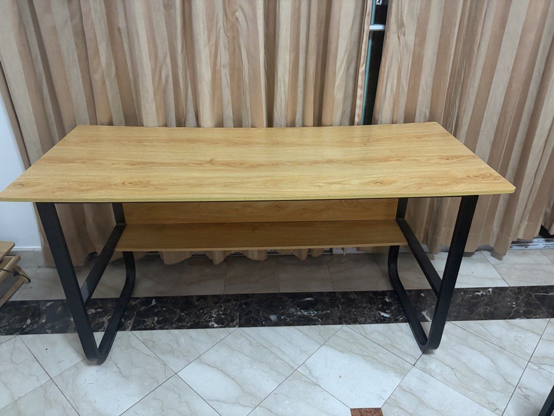 Study table / work desk (Category: Tables & Sets) located in Singapore. Submitted by rmz1902 (Listing ID 1454890023, Image 2). Description: Study table or work desk Selling as we are moving houses. Otherwise no defects in the table. Dimensions (l*b*h) - 140*60*70 cm Self collect at Hume Avenue - symphony heights condo .