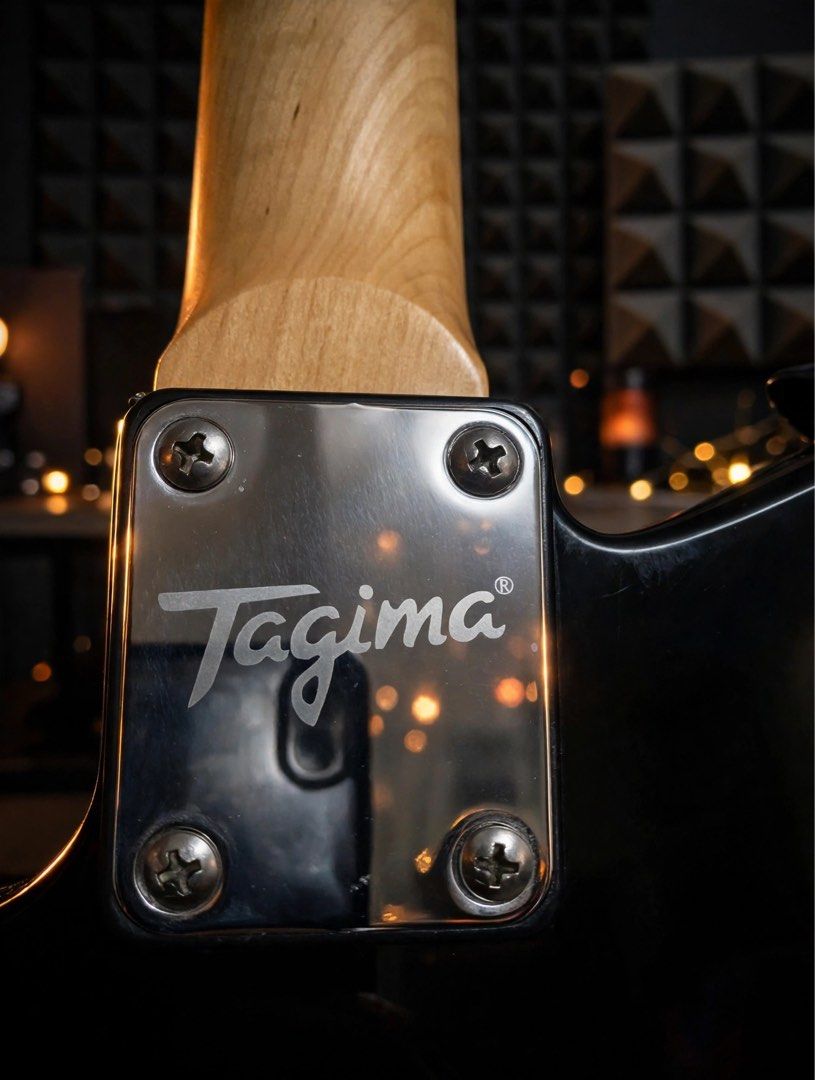 Tagima TW Series Electric Guitar - Black (Category: Musical Instruments) located in Bacoor. Submitted by frake5000 (Listing ID 1454905929, Image 1). Description: - Brand: Tagima - Model: TW Series - Style: Telecaster-style electric guitar - Neck Material: Maple - Fretboard Material: Maple - Color: Black - Condition: Ready for a new home, great for playing music. Upgraded: Bridge pickup to Alnico 5 ceramic hot rail. Original D’addario 10-52 string