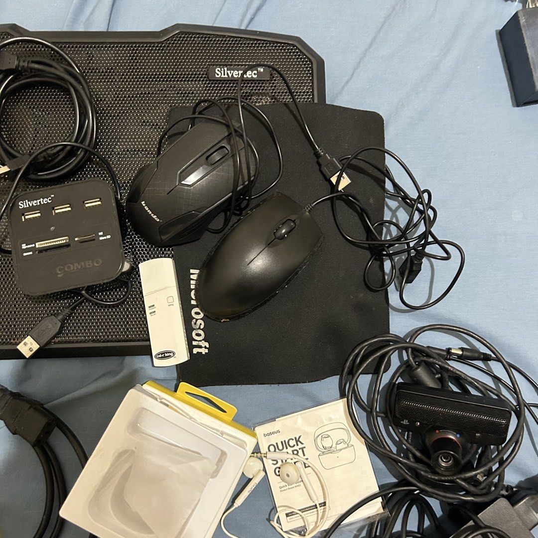 TAKE ALL ELECTRONIC DEVICES (Category: Chargers & Cables) located in San Fernando. Submitted by gothclaudiaa (Listing ID 1454943729, Image 3). Description: TAKE ALL Includes: USB hub from octagon (functional) SONY PLAYSTATION EYE CAMERA (functional) Laptop Cooling pad with lights from octagon (functional) Powerbank from octagon (functional) Wifi dongle (not in use na pero functional pa) Earphones (yung isa fully functional, working yung dalawa pe