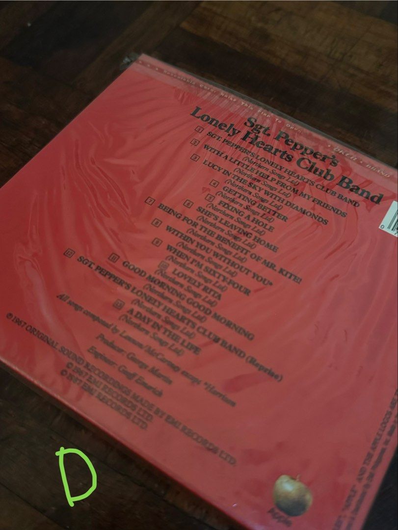 The Beatles CDs (Category: CDs & DVDs) located in Quezon City. Submitted by kittyrawr5 (Listing ID 1454846921, Image 3). Description: A: Let It Be - still in plastic wrapping, so there’s no pic of actual CD B: SOLD C: SOLD D: Sgt. Pepper’s Lonely Hearts Club Band - still in plastic wrapping, so there’s no pic of actual CD E: The Beatles: Double Golden Collection - 2 CDs - individual cd: PHP 400 - all remaining cds: PHP 800.