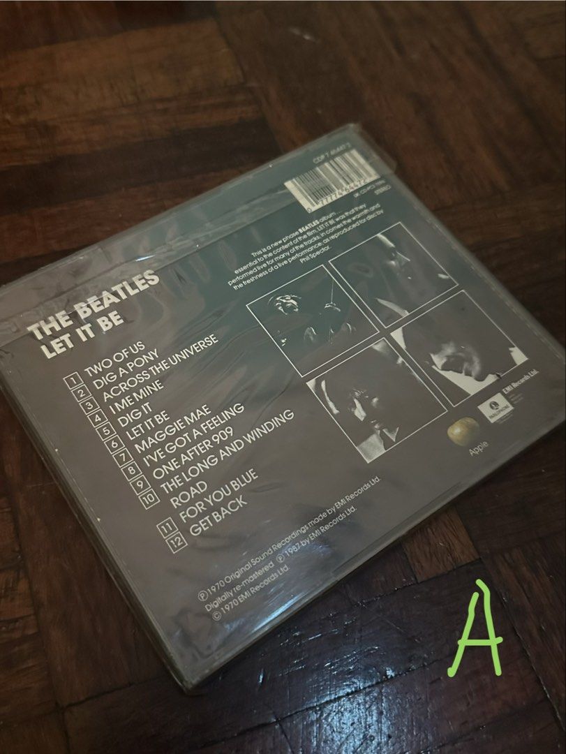 The Beatles CDs (Category: CDs & DVDs) located in Quezon City. Submitted by kittyrawr5 (Listing ID 1454846921, Image 2). Description: A: Let It Be - still in plastic wrapping, so there’s no pic of actual CD B: SOLD C: SOLD D: Sgt. Pepper’s Lonely Hearts Club Band - still in plastic wrapping, so there’s no pic of actual CD E: The Beatles: Double Golden Collection - 2 CDs - individual cd: PHP 400 - all remaining cds: PHP 800.