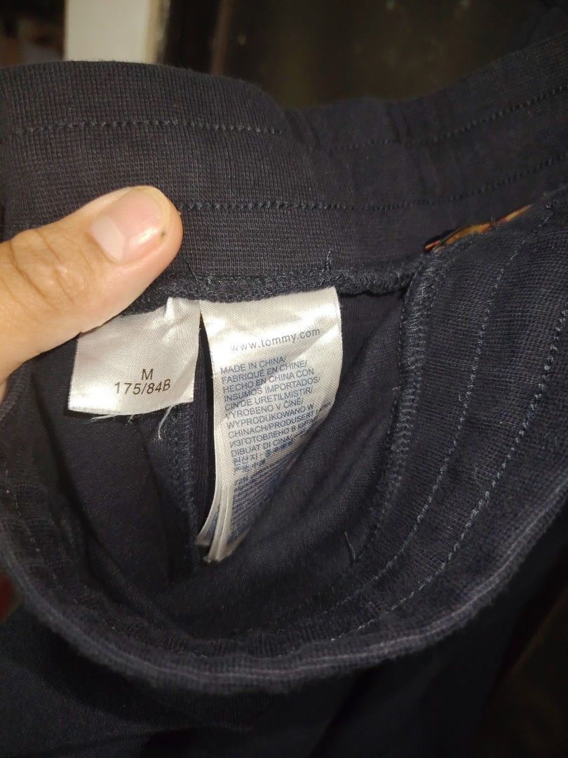 Tommy Hilfiger jogging pants nvy blue (Category: Joggers) located in Malabon City. Submitted by jhe_bicio_online-thriftshop (Listing ID 1454894593, Image 3). Description: Size M on tag Waist 32 up garterized Length 38 Garterized hem.