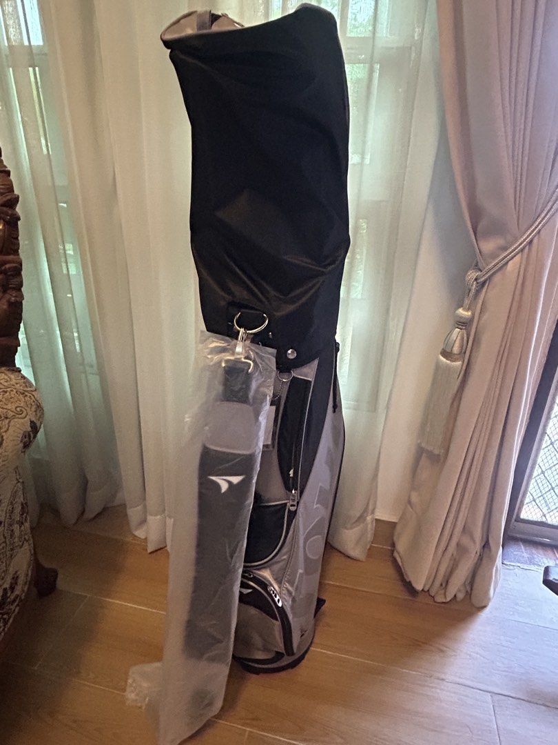TOURSTAGE Lightweight Caddy Golf Bag (Category: Golf) located in Quezon City. Submitted by jaybreakspar (Listing ID 1454932412, Image 3). Description: STAGE TOUR lightweight caddy bag. Black/grey. Lots of pockets, includes rain hood. Easy to carry, perfect for any golfer..