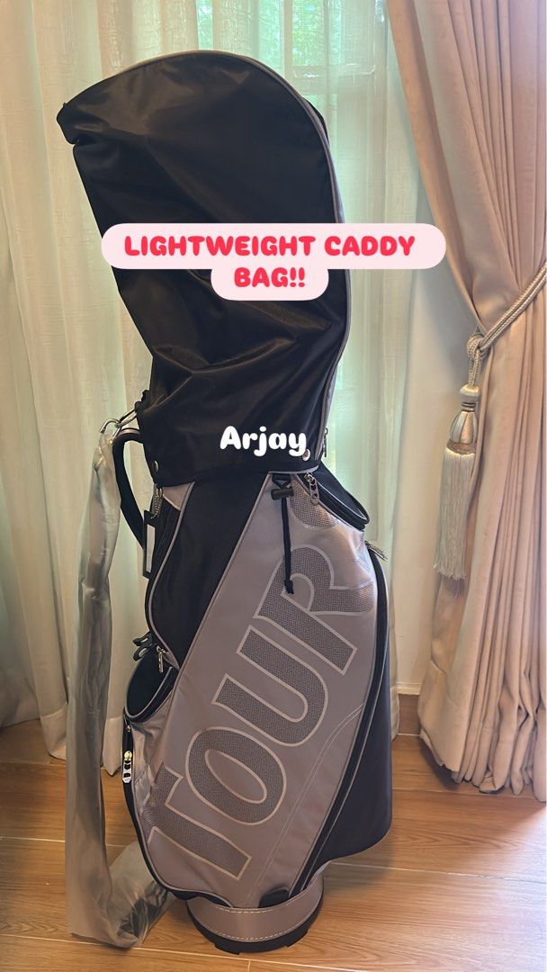 TOURSTAGE Lightweight Caddy Golf Bag (Category: Golf) located in Quezon City. Submitted by jaybreakspar (Listing ID 1454932412, Image 2). Description: STAGE TOUR lightweight caddy bag. Black/grey. Lots of pockets, includes rain hood. Easy to carry, perfect for any golfer..
