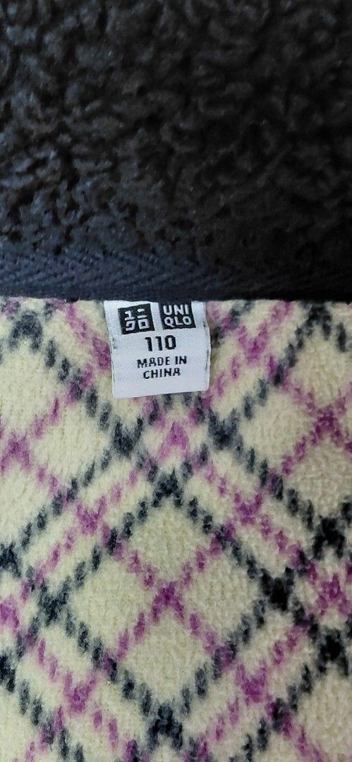 Uniqlo Kids Fleece Jacket (Category: Babies & Kids Fashion) located in Paranaque City. Submitted by shellatan21 (Listing ID 1454897704, Image 2). Description: - Kids' black fleece jacket - Cozy plaid lining - Full front zipper - Size 110 - Price is per pc (2 pcs available).