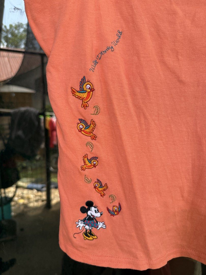 Y2K WALT DISNEY WORLD tanktop (Category: Sleeveless) located in Manolo Fortich. Submitted by thriftacktoe34 (Listing ID 1454789630, Image 2). Description: Excellent condition Adjustable strap Color rate 9/10 Size Medium Dimes W16 x L21 Issue: minimal brown stain barely noticeable FREE shippinf fee.