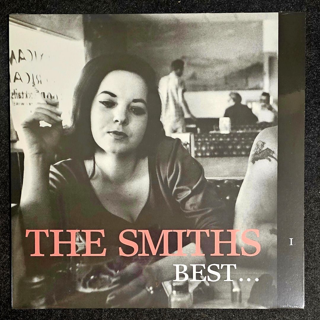 [Vinyl LP] The Smiths – Best... I (Category: Vinyls) located in Cainta. Submitted by bunnygod (Listing ID 1454790838, Image 1). Description: EU pressed, 2026, Reissue WEA – 5026854705422 📀 📂 New/sealed 🎶 New Wave A1 This Charming Man 2:41 A2 William, It Was Really Nothing 2:10 A3 What Difference Does It Make? 3:50 A4 Stop Me If You Think You've Heard This One Before 3:33 A5 Girlfriend In A Coma 2:02 A6 Half A Person 3:35 A7 Rubber Ring 3:46 B1