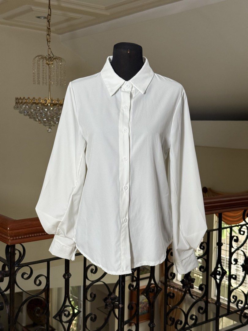 White LongSleeves Collared Top (Category: Blouses) located in Makati City. Submitted by VersatileBabe (Listing ID 1454941430, Image 1). Description: .