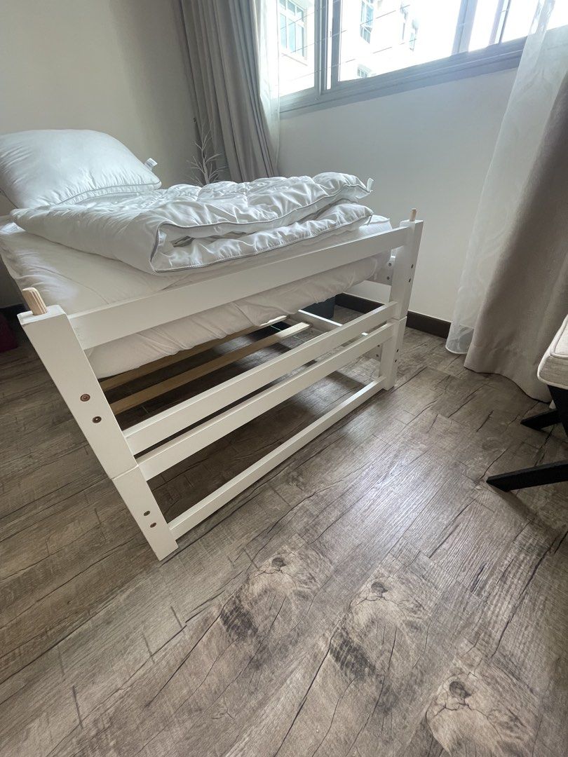 White Stackable Bed Frame - Single (Category: Bed Frames & Mattresses) located in Singapore. Submitted by ksacha30 (Listing ID 1454831726, Image 2). Description: - White GR Furniture stackable bed frame - Multi-functional: single bed, sofa bed, or queen bed when combined - Excellent for storage - Features solid wood slats - Easy to assemble and reconfigure - Perfect for small apartments or guest rooms - Matress not included - price inclusive of d