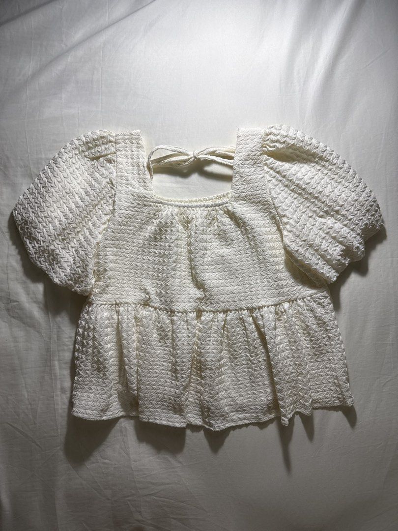 White Textured Square Neck Puff Sleeve Peplum Top (Category: Blouses) located in Quezon City. Submitted by minispirea (Listing ID 1454833289, Image 1). Description: Bought from a local store in Hong Kong Brand new / never worn and didn’t come with a tag - White textured top - Square neckline - Puff sleeves - Peplum hem - Ribbon tie-back design - Soft fabric • On hand & ready to ship • More photos/videos available upon request • Pay as you order •